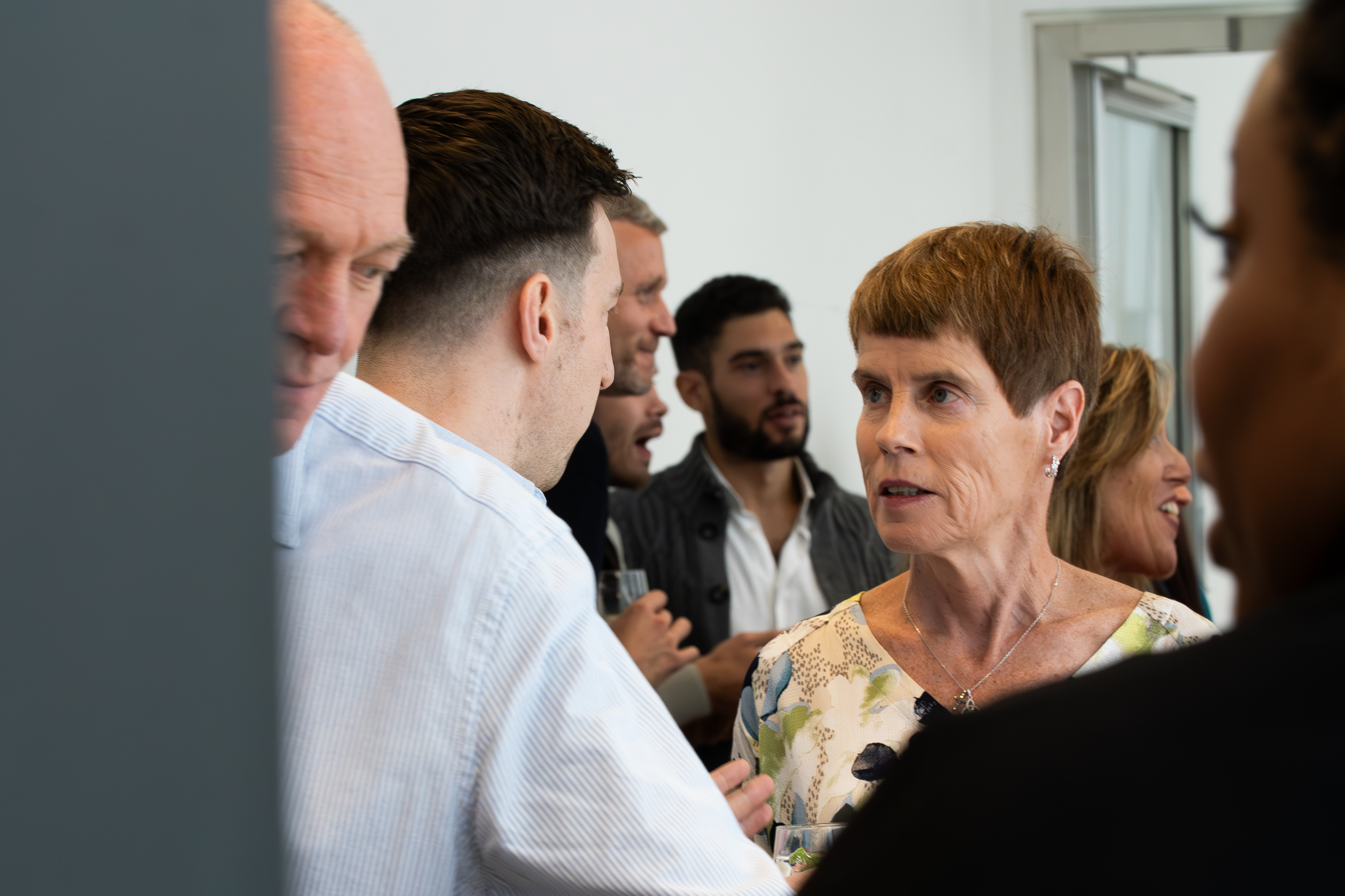 Diverse group of professionals networking